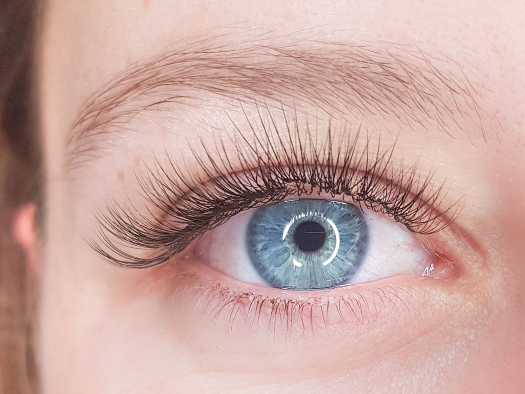 Classic eyelash extensions at Sugaring NYC McKinney — open eye lift result