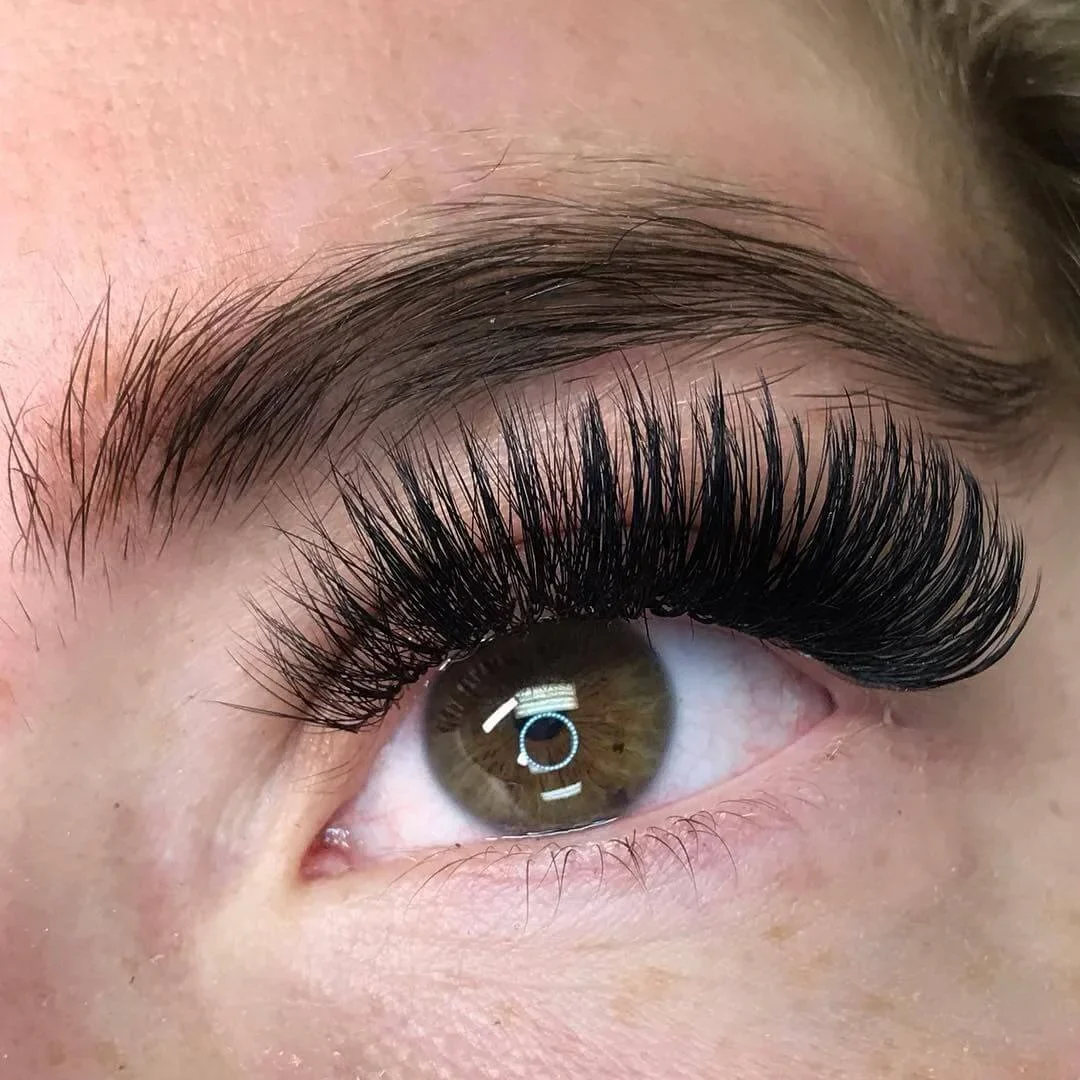 Mega Volume lashes at Sugaring NYC McKinney TX — dramatic bold lash set result
